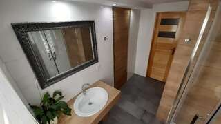 Проживание в семье Pokoje do Wynajęcia u Lusi Кросценко Четырехместный номер с общей ванной комнатой в коридоре-9
